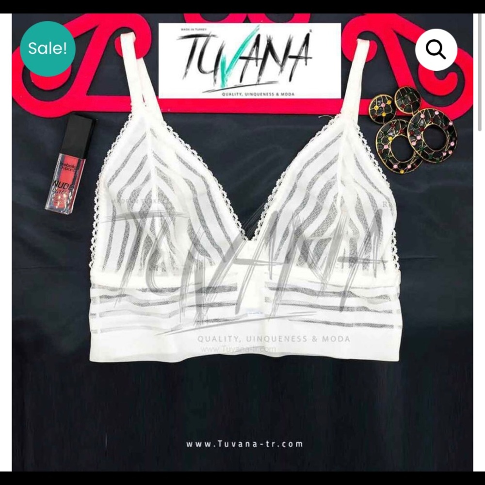 A modern design white bralette with striped lace
